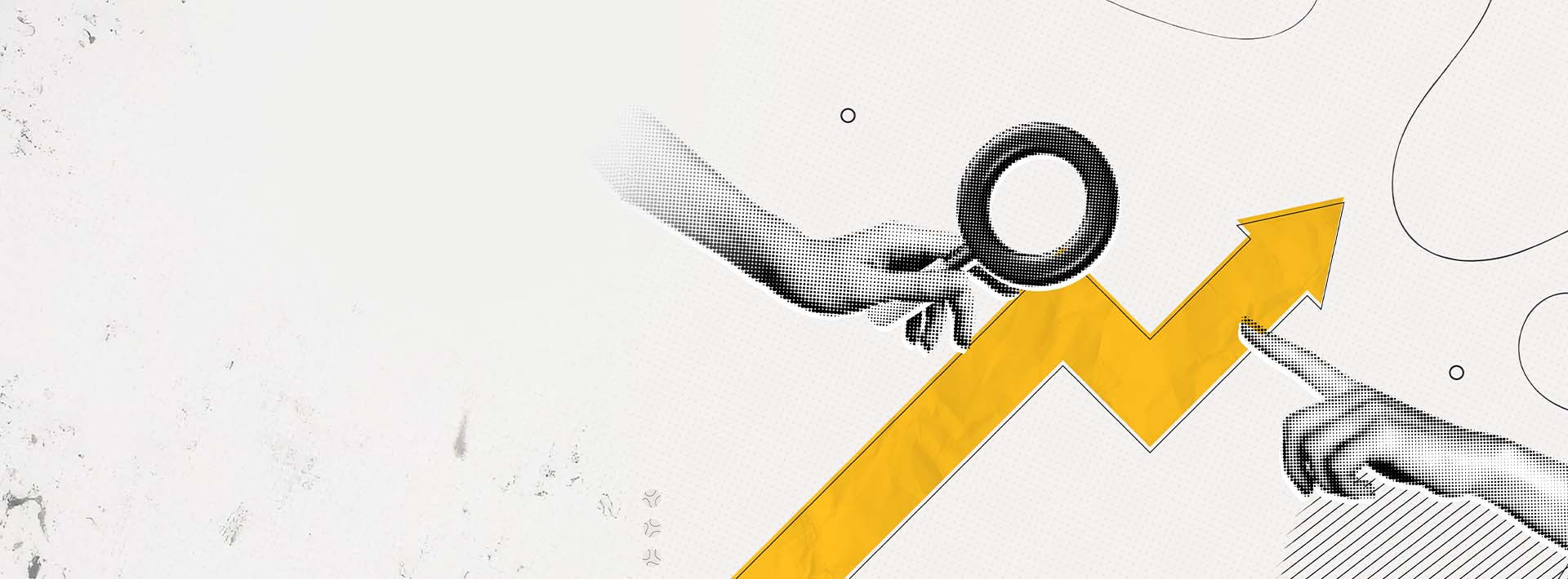 Dłoń trzymająca lupę nad rosnącym wykresem strzałkowym