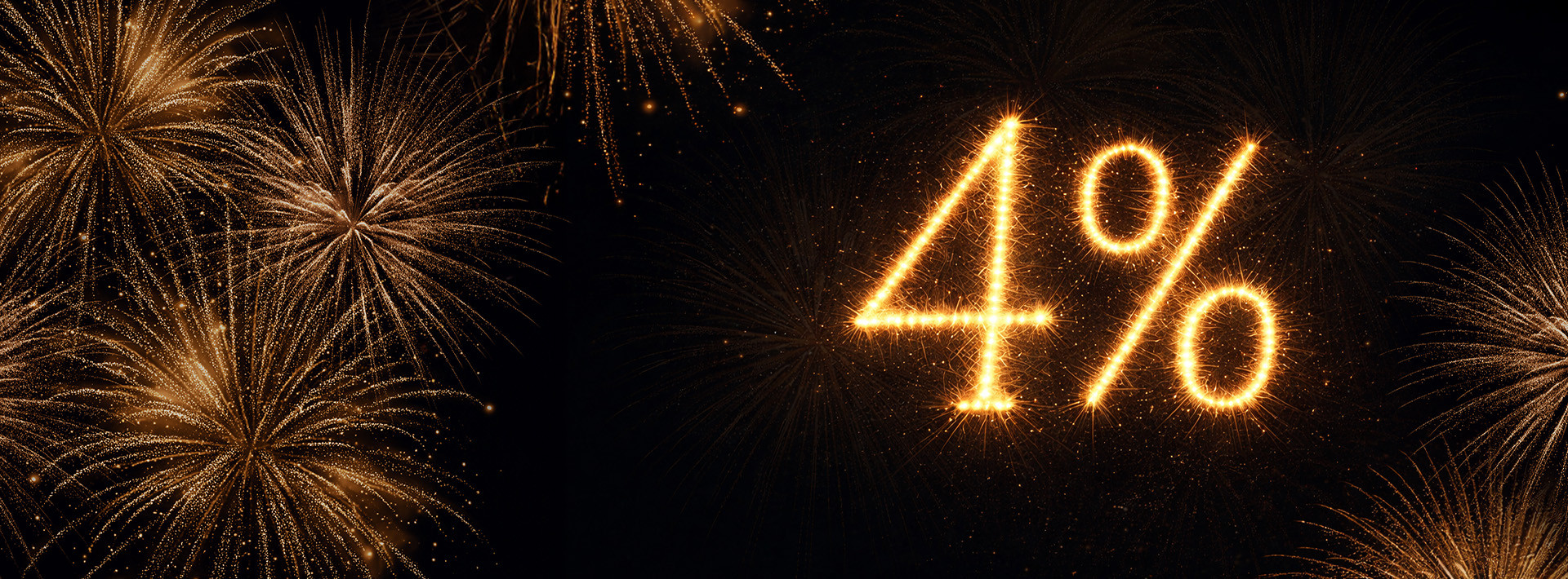 liczba 4% w złotym kolorze ułożona na czarnym tle z fajerwerkami