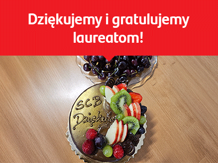 na zdjęciu jest tort z napisem SCB Dziękuję, a na górze hasło Dziękujemy i gratulujemy laureatom!